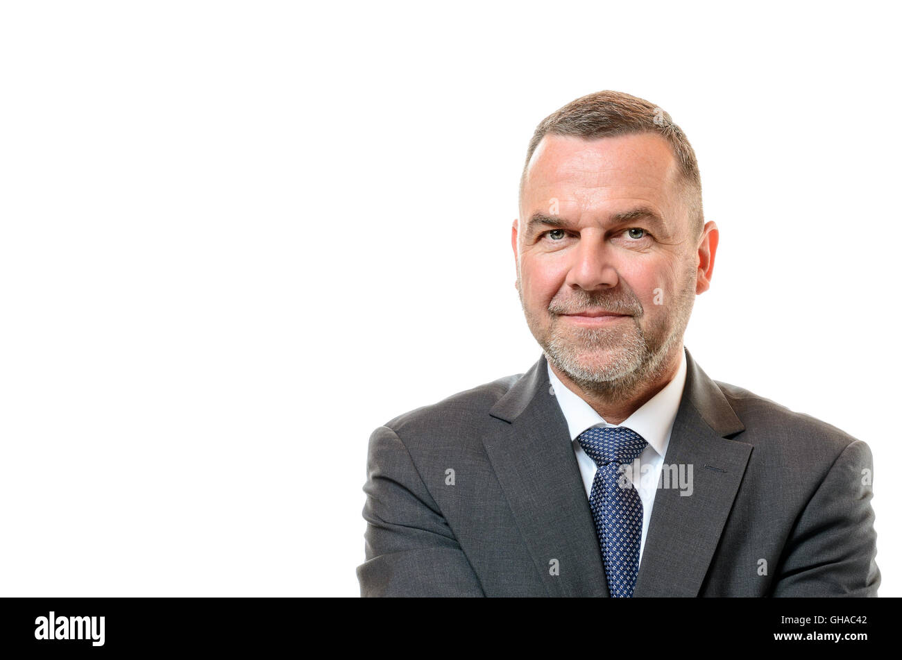 Stylish middleaged businessman with a short stubbly beard and a