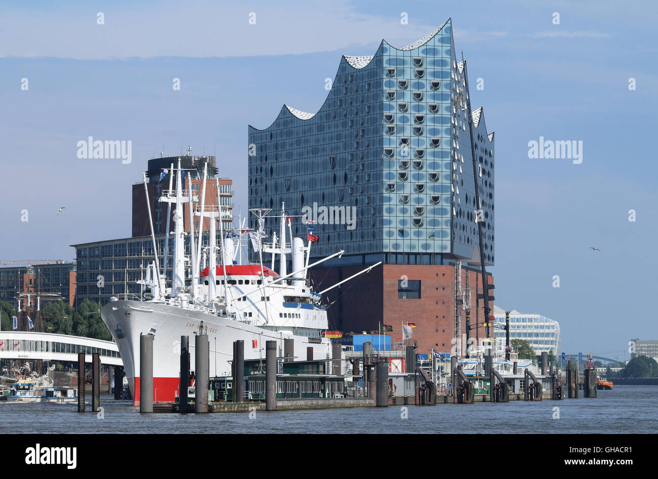 Hamburg waterfront. Elbphilharmonie concert hall and museum ship Cap ...