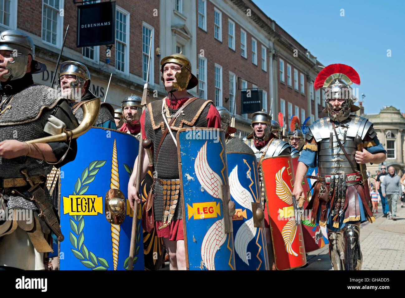 Soldiers marching through the city centre at the Roman Festival in summer York North Yorkshire England UK United Kingdom GB Great Britain Stock Photo