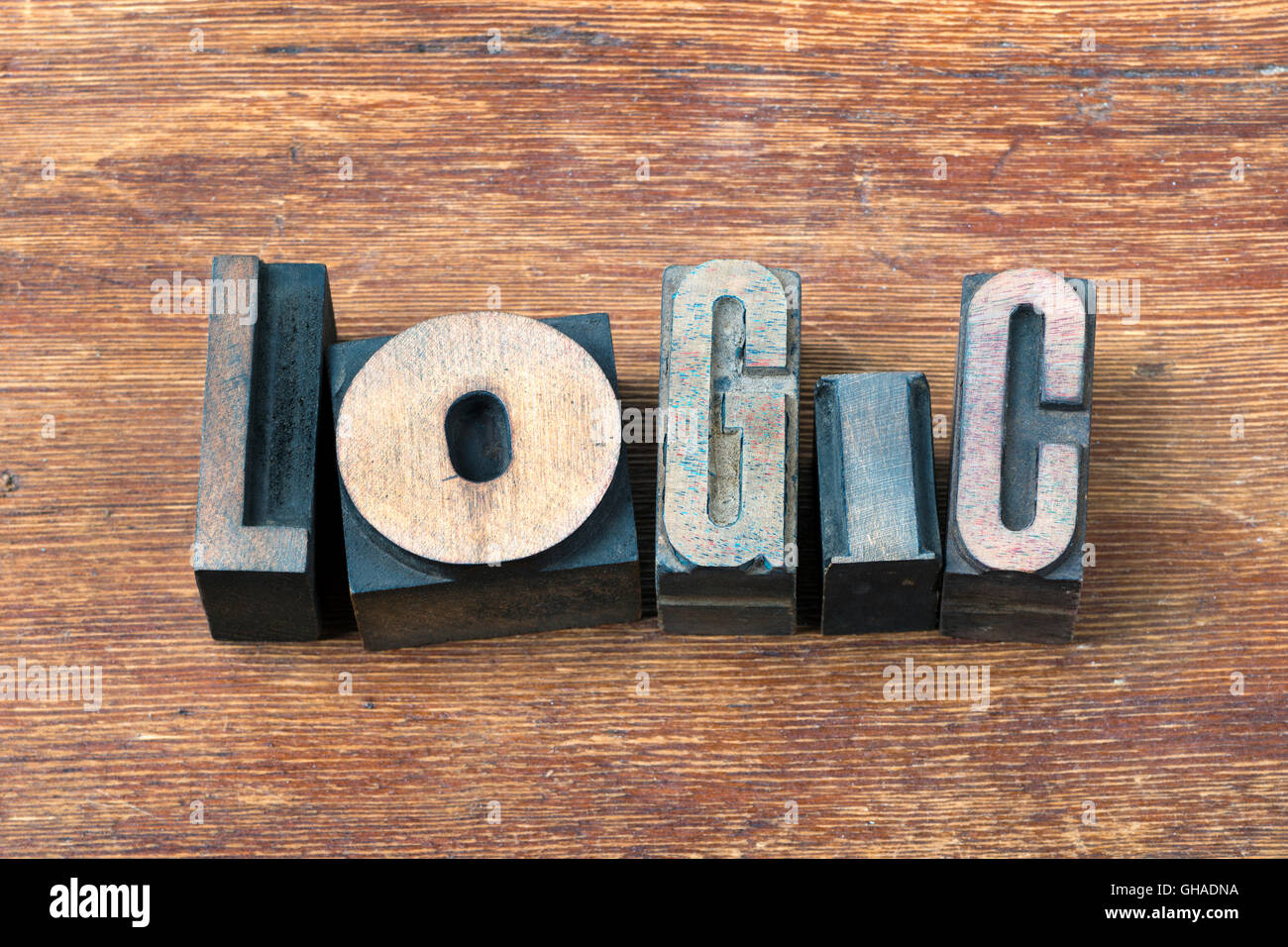 logic word  made from scattered wooden letterpress type on grunge wood Stock Photo