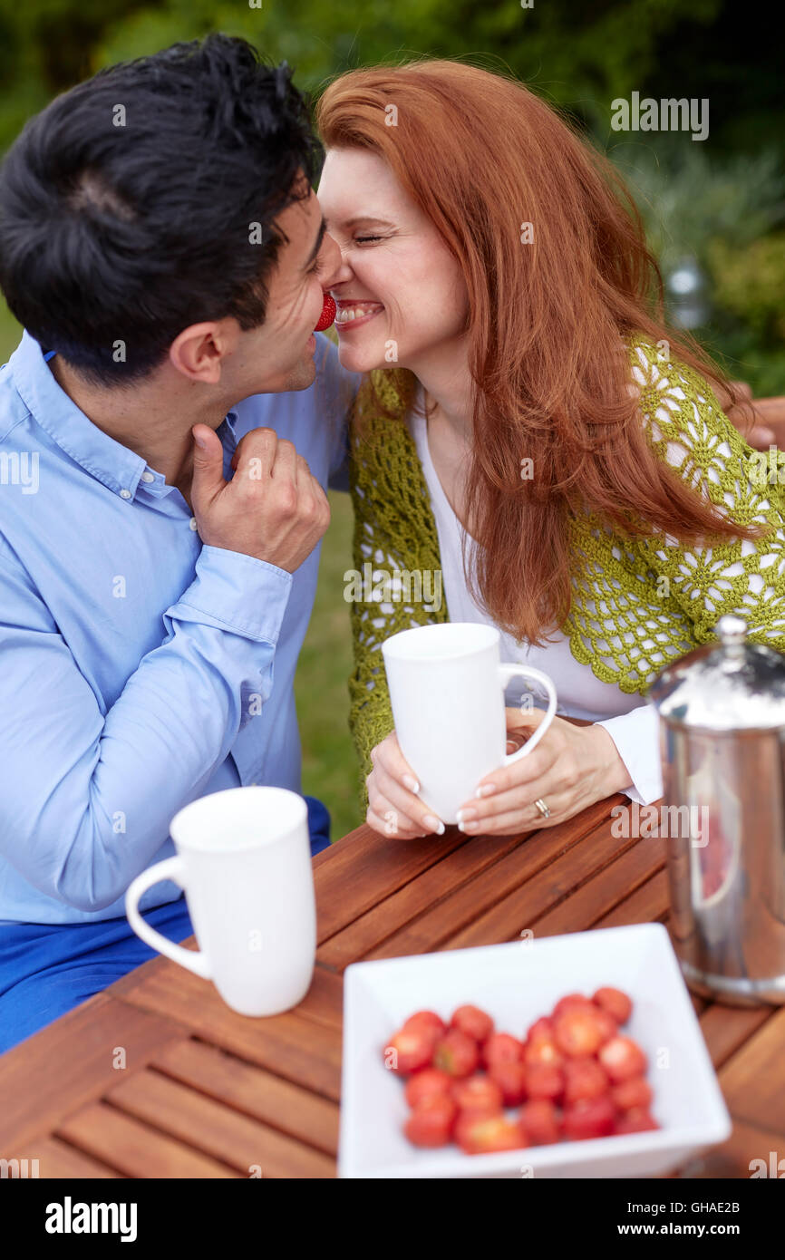 Couple cuddling in cafe girl hi-res stock photography and images - Alamy