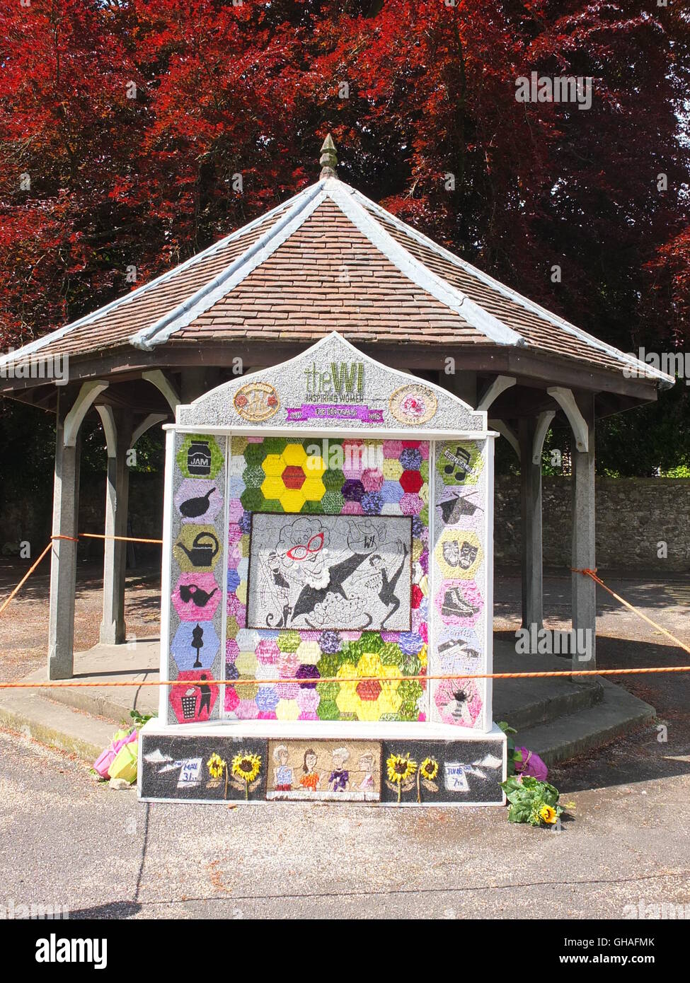 A 2015 well dressing commemorating 100 years of the WI at Ashford-in-the-Water, Derbyshire Stock Photo