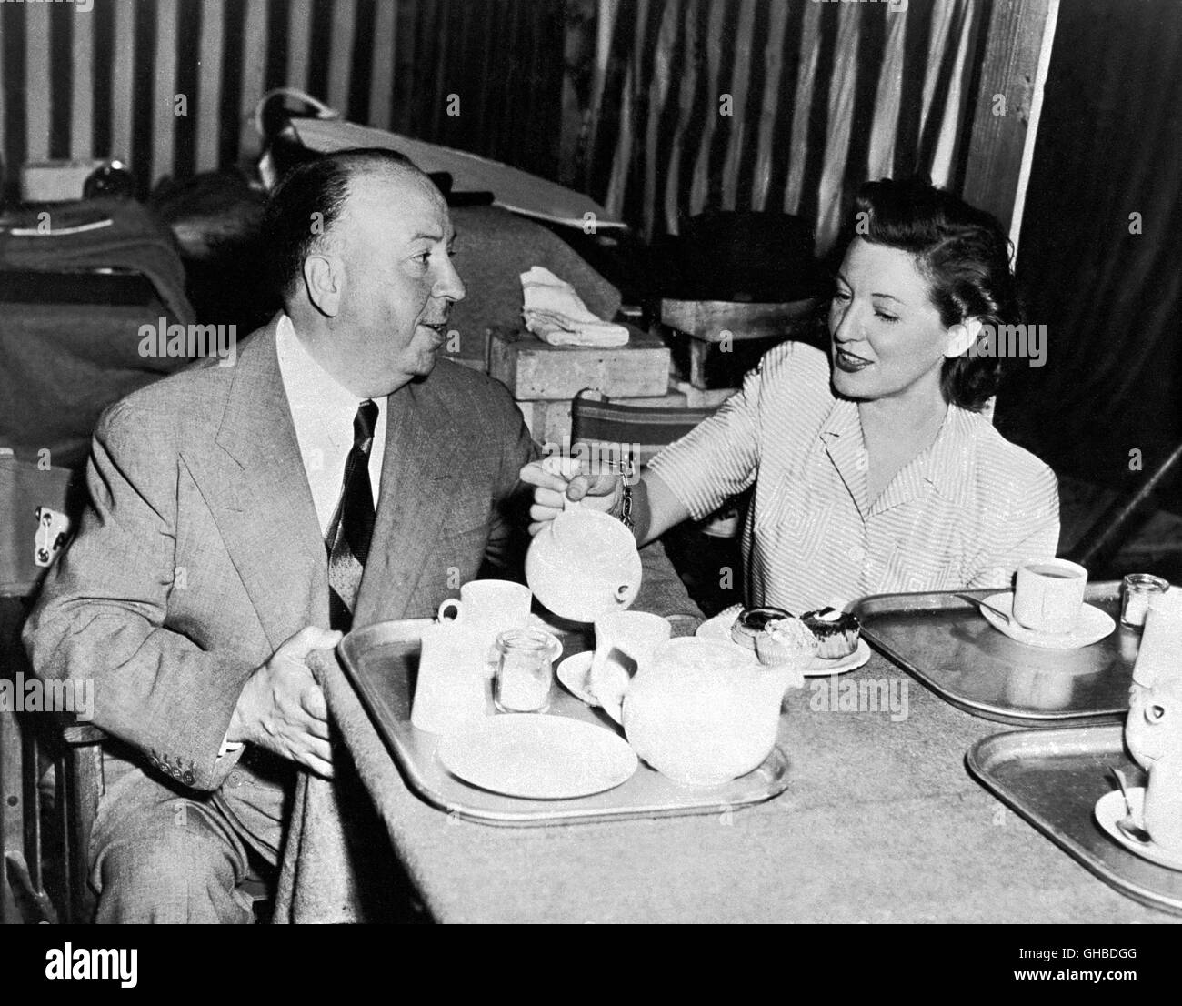 Director ALFRED HITCHCOCK (1899-1980) takes a cup of tea during a shooting  break of ' Rebecca ' (1940 Stock Photo - Alamy