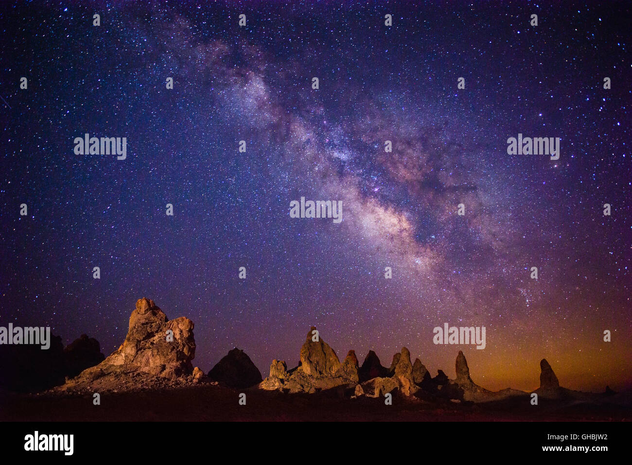 The Milky Way Galaxy over the Trona Pinnacles in California. Stock Photo