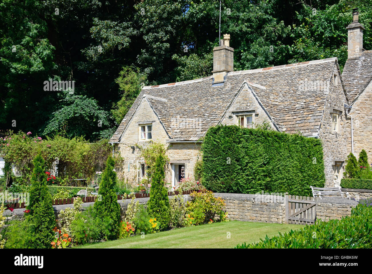 Pretty Cotswold cottage and garden during the Summertime, Bibury