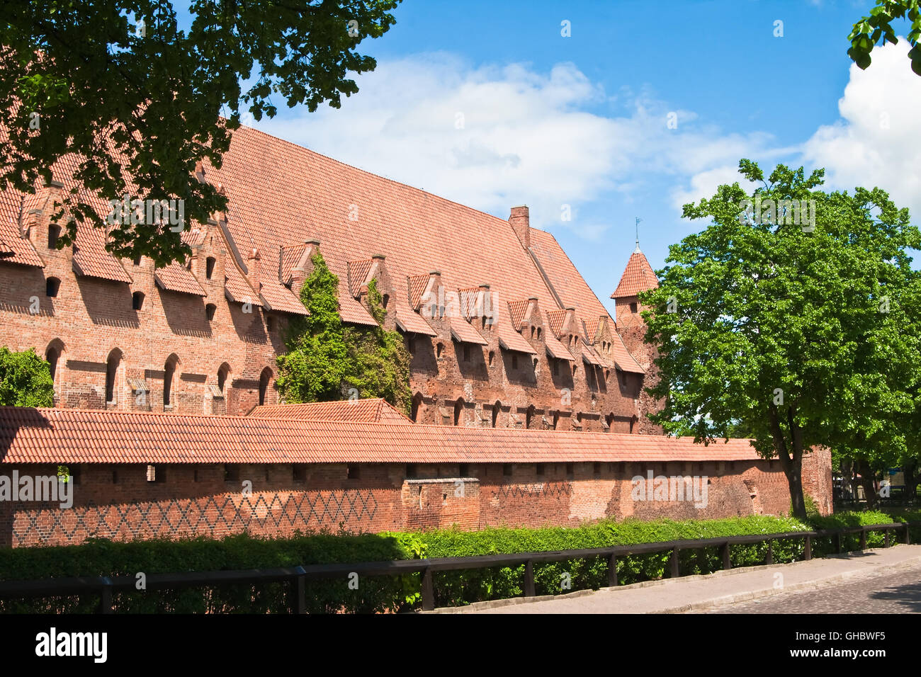 Average Malbork Castle in Poland opposite the outer side of the river Stock Photo