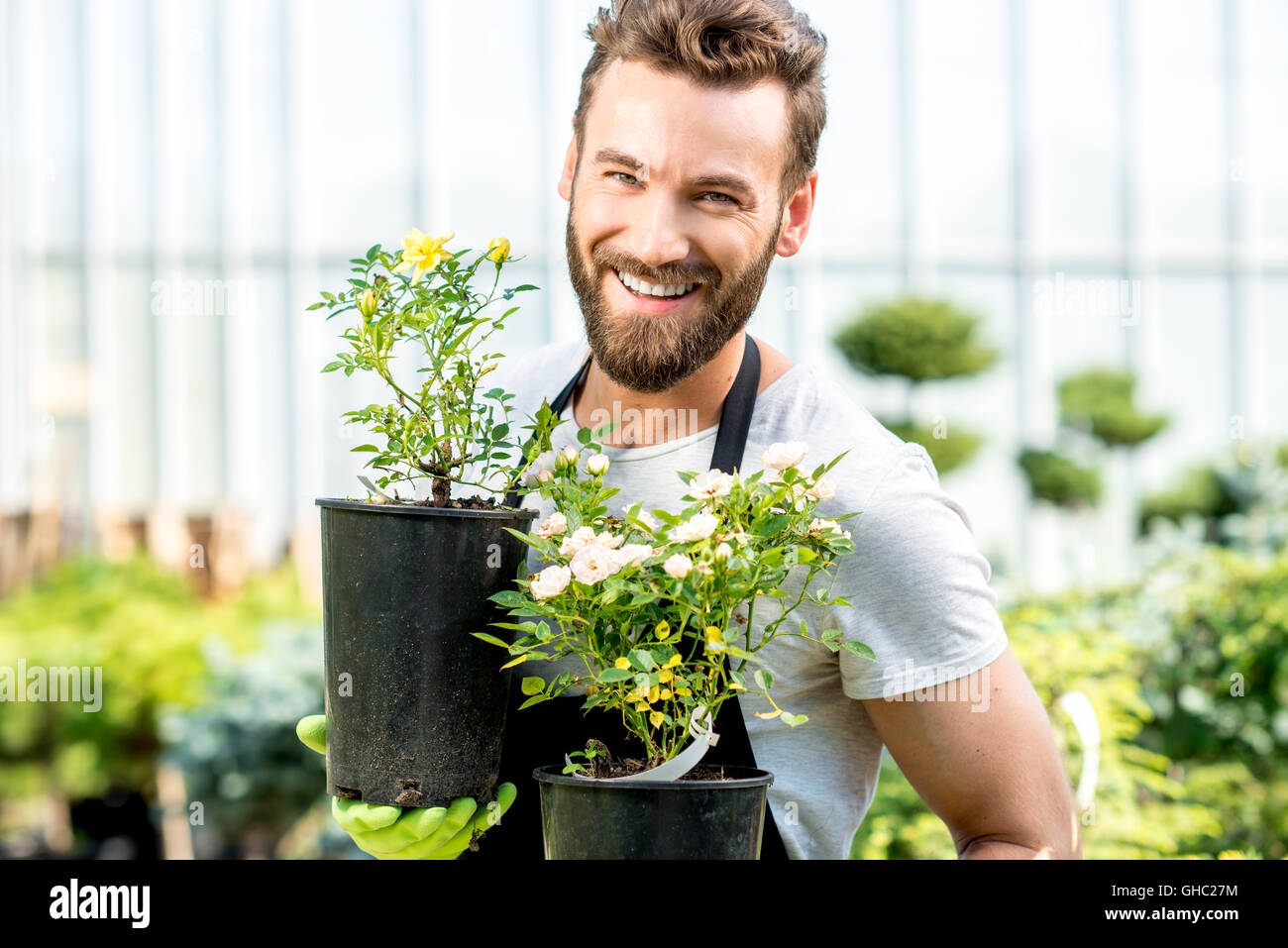 Gardener with a flowerpot Stock Photo Alamy