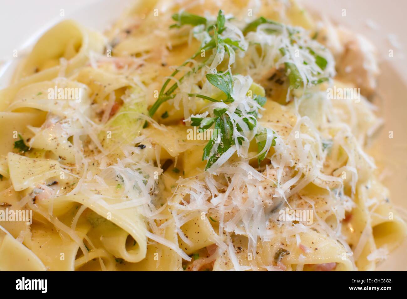 Tagliatelle pasta with cheese sauce Stock Photo Alamy