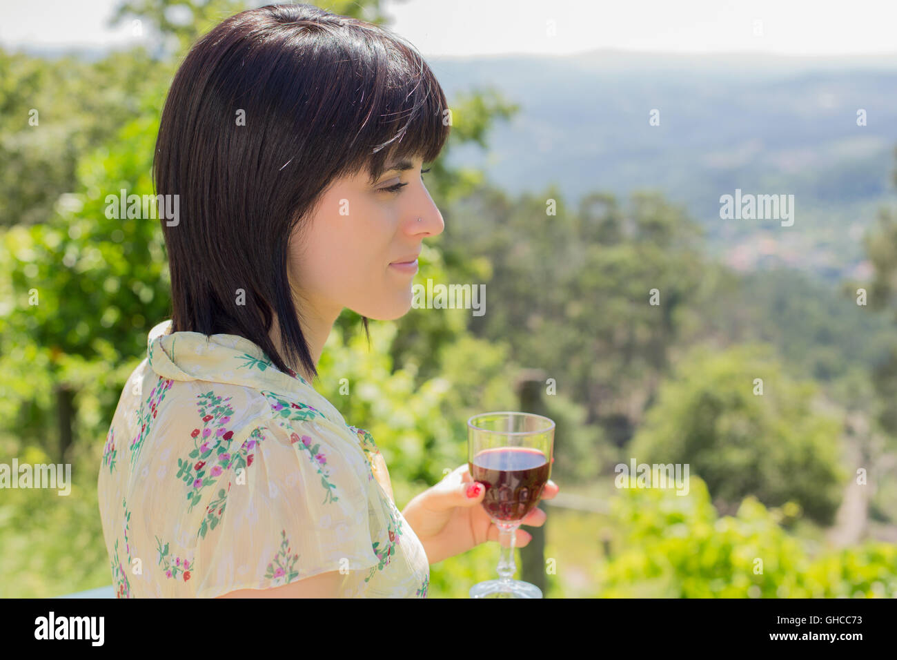 woman drinking red wine in a vineyard, outdoor Stock Photo - Alamy