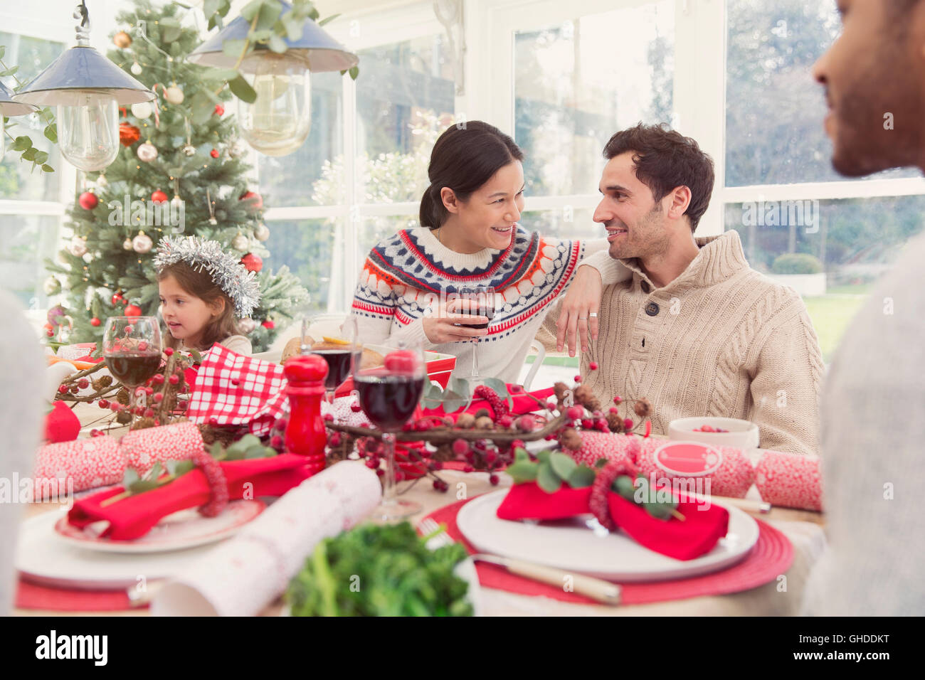 Family enjoying Christmas dinner Stock Photo