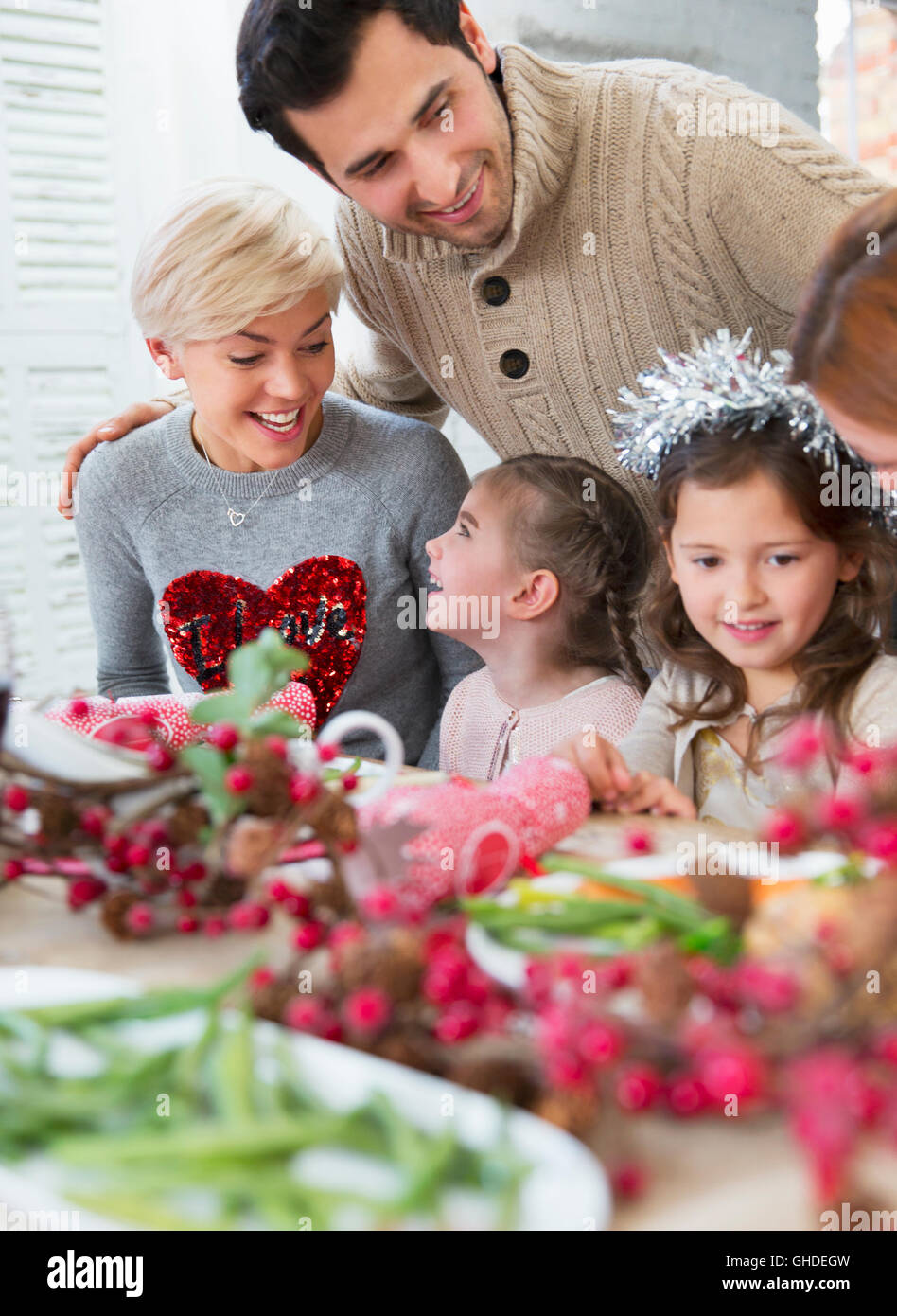 Family enjoying Christmas dinner Stock Photo