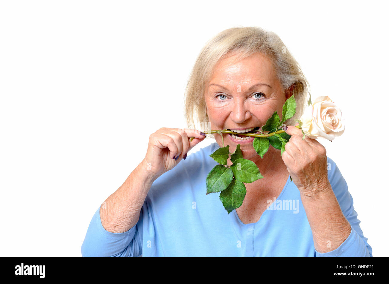 Funny Older Woman In Blue Blouse And Short Hair Holding White Rose
