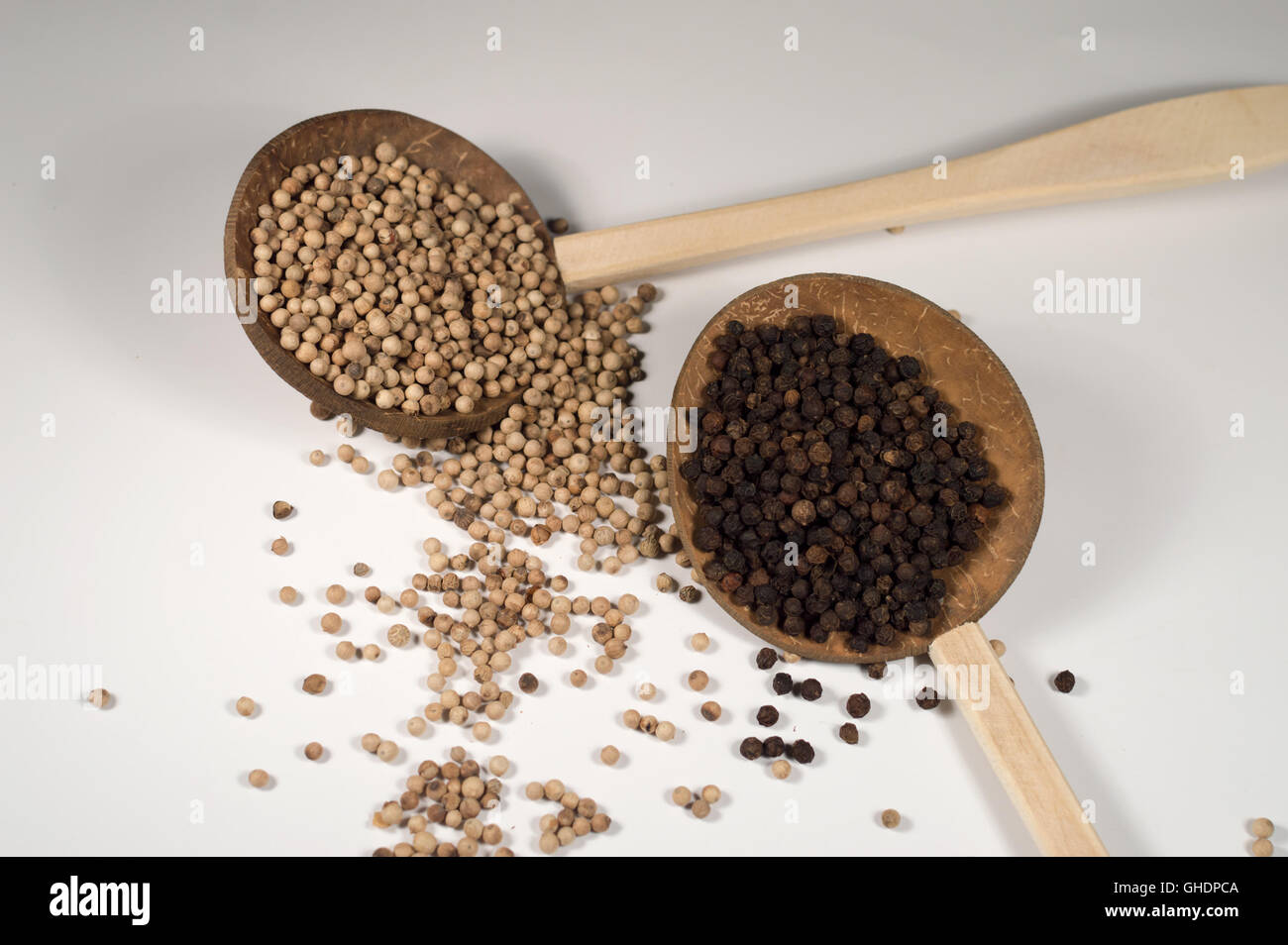 Black and white peppercorn, pepper Stock Photo Alamy