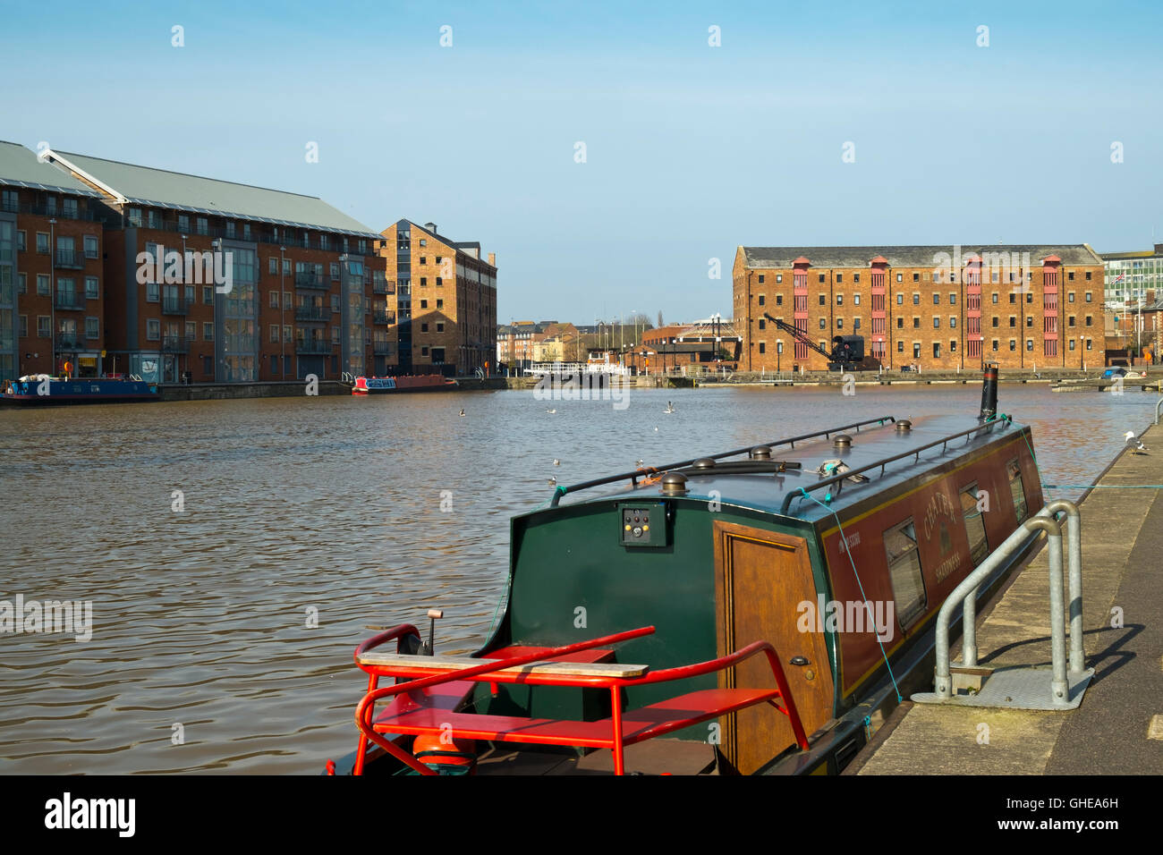 Colourful canalboat moored in spring sunshine, Gloucester Docks, Gloucester, UK Stock Photo