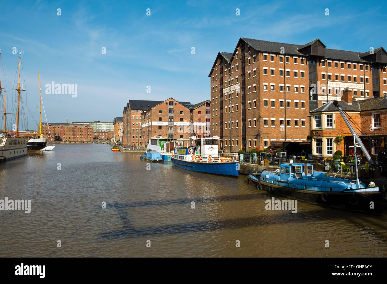 Historic boats moored by the Waterways Museum in Gloucester Docks, Gloucester, UK Stock Photo