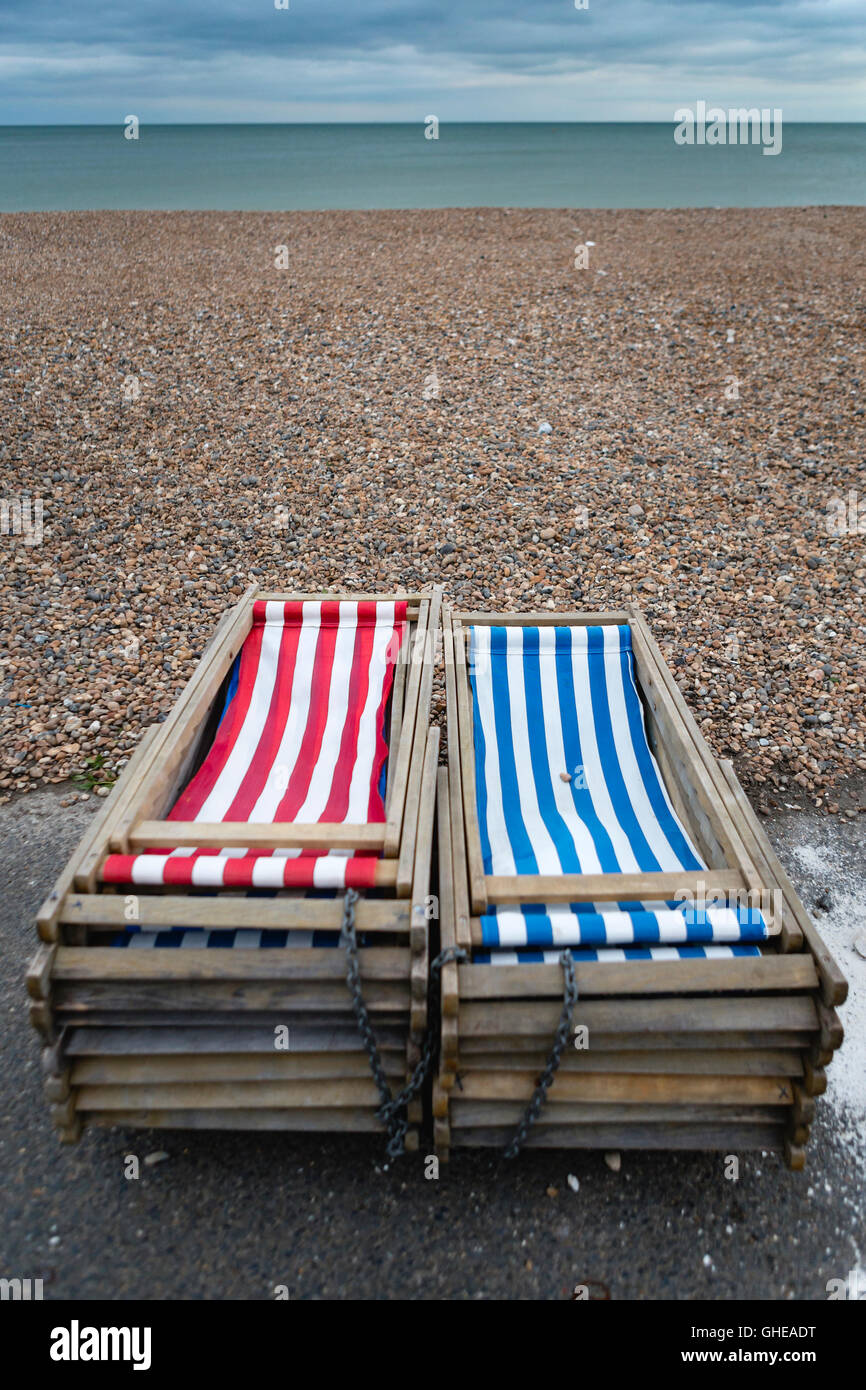 Deck chair on pebble beach hi-res stock photography and images - Alamy