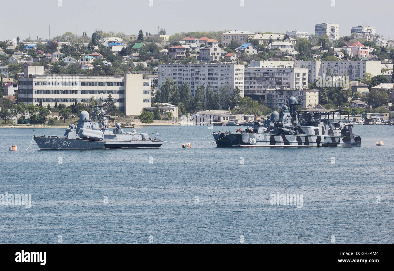 Russian naval warships in the Bay of Sevastopol Crimean Peninsula Stock Photo