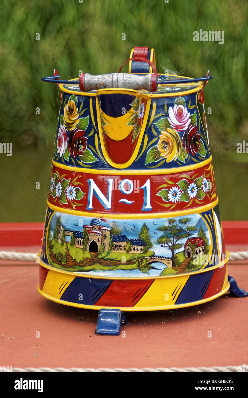decorated water can on roof of canal boat Stock Photo