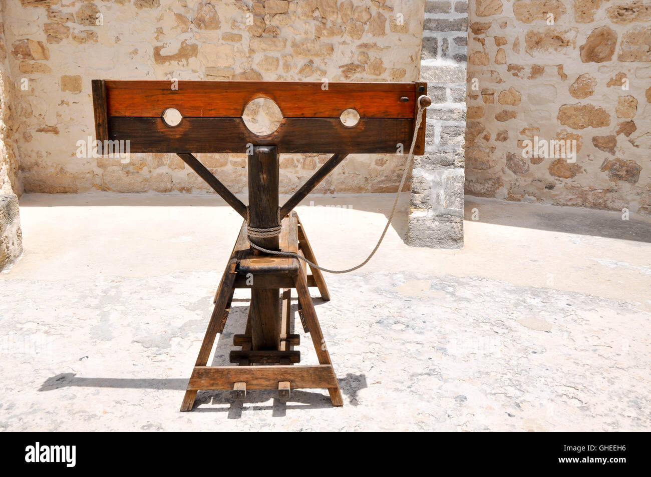 Wooden punishment stocks in courtyard at the old Round House historic