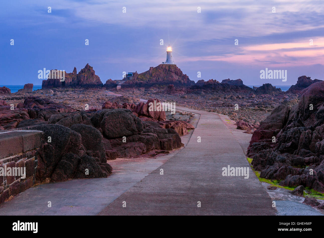 Jersey Lighthouse at sunset Stock Photo Alamy