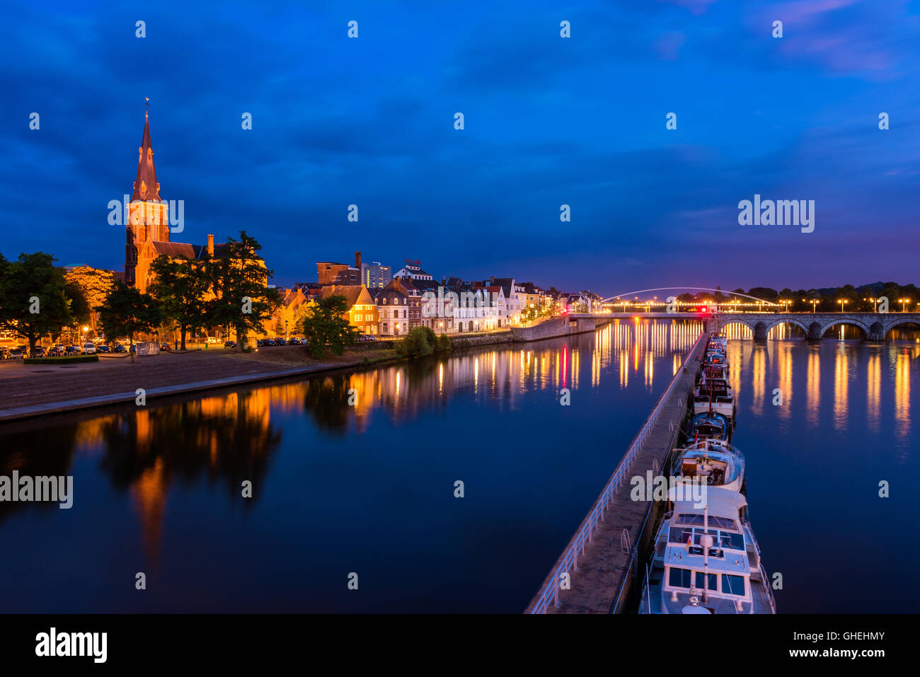 Maastricht Netherlands and Maas River at dusk Stock Photo