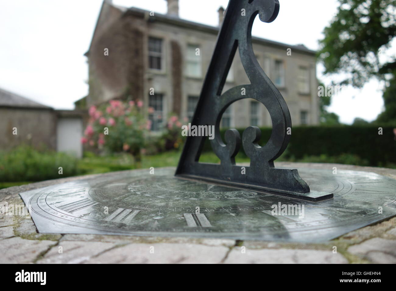 18th Century sundial with house in background, The Argory, Northern