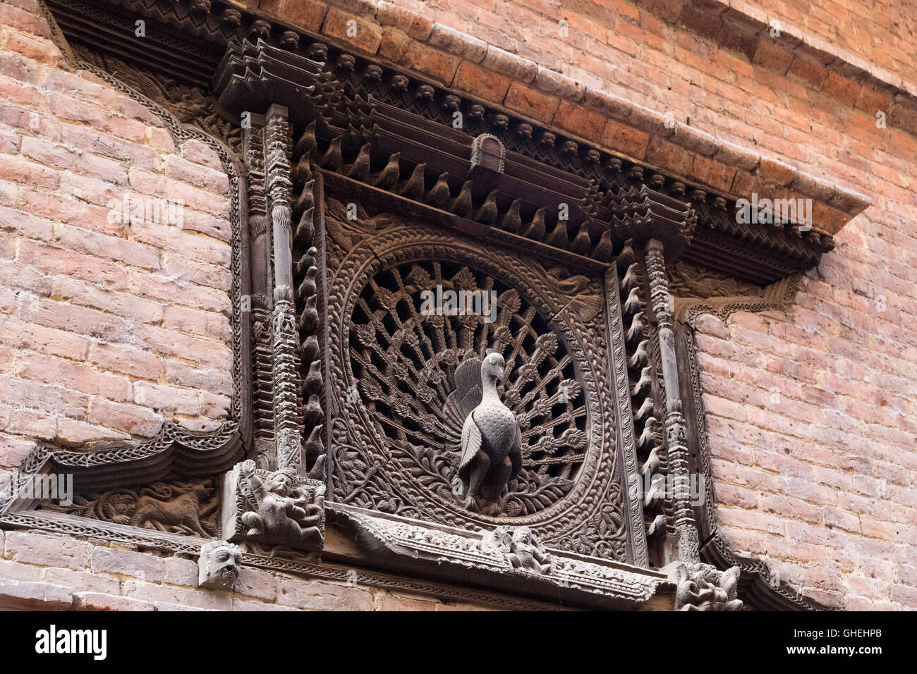 Bhaktapur, Nepal - December 4, 2014: A beautiful carved window called the Peacock window Stock Photo