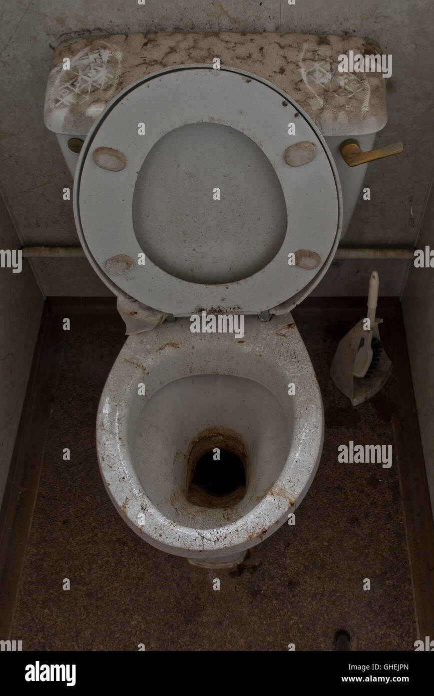 Dirty toilet inside De Salis Hall Within the closed Harperbury Hospital