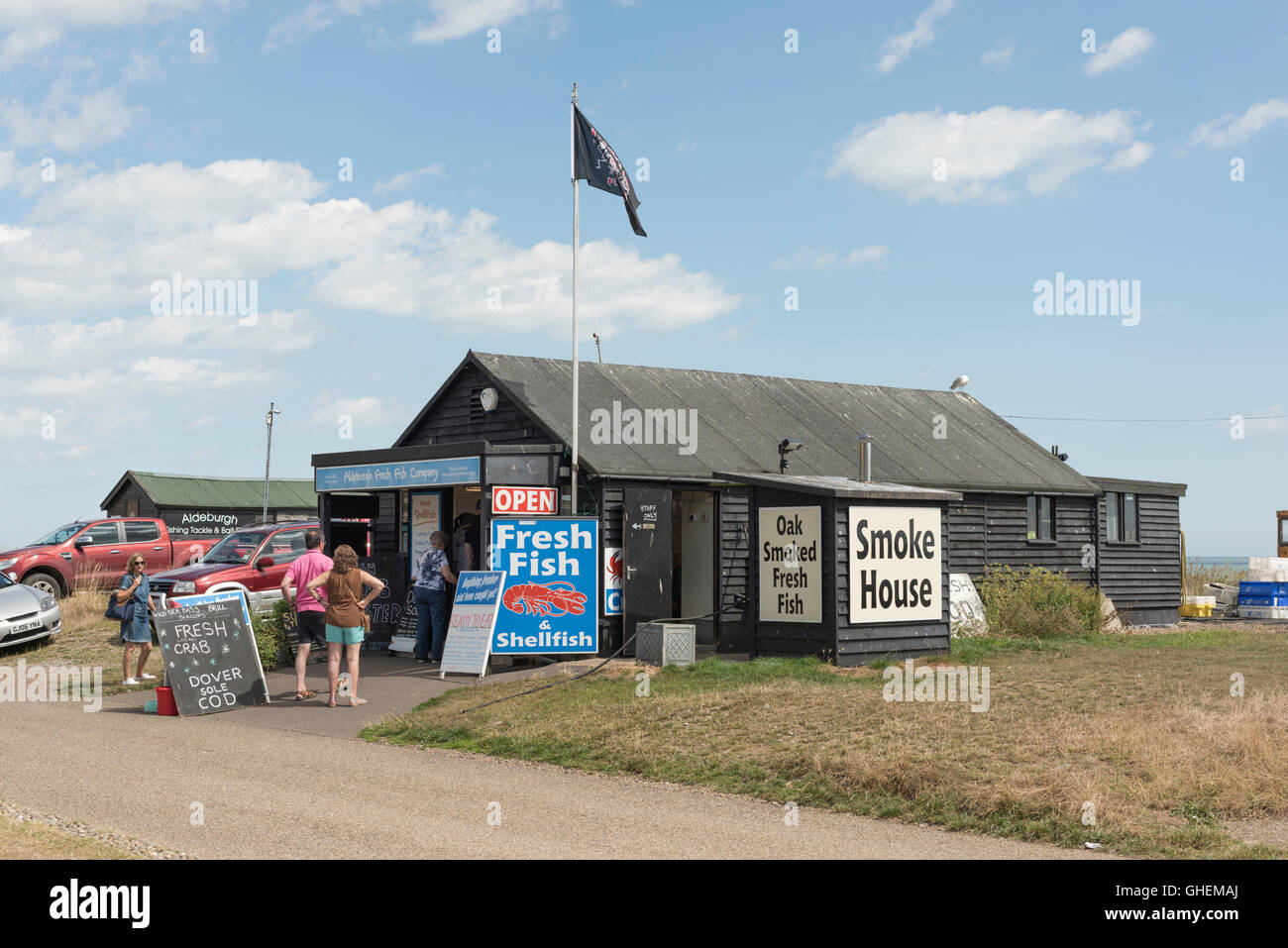 The Aldeburgh Fresh Fish Company smoke house and fresh fish shop shed on the beach at Aldeburgh Suffolk UK Stock Photo