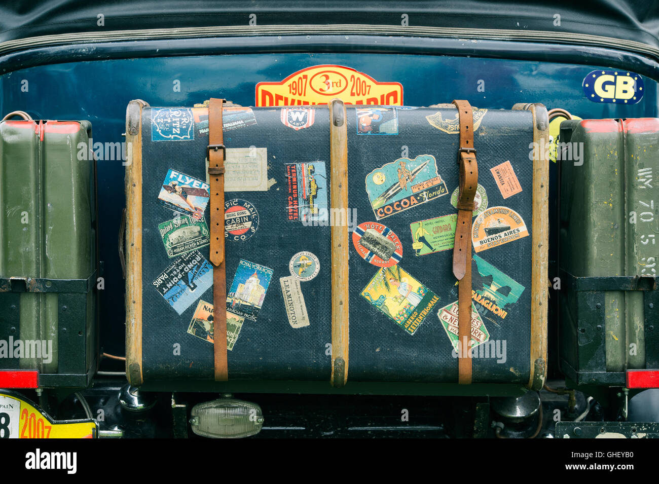 Old traveling trunk on a vintage car. UK. Vintage filter applied Stock Photo