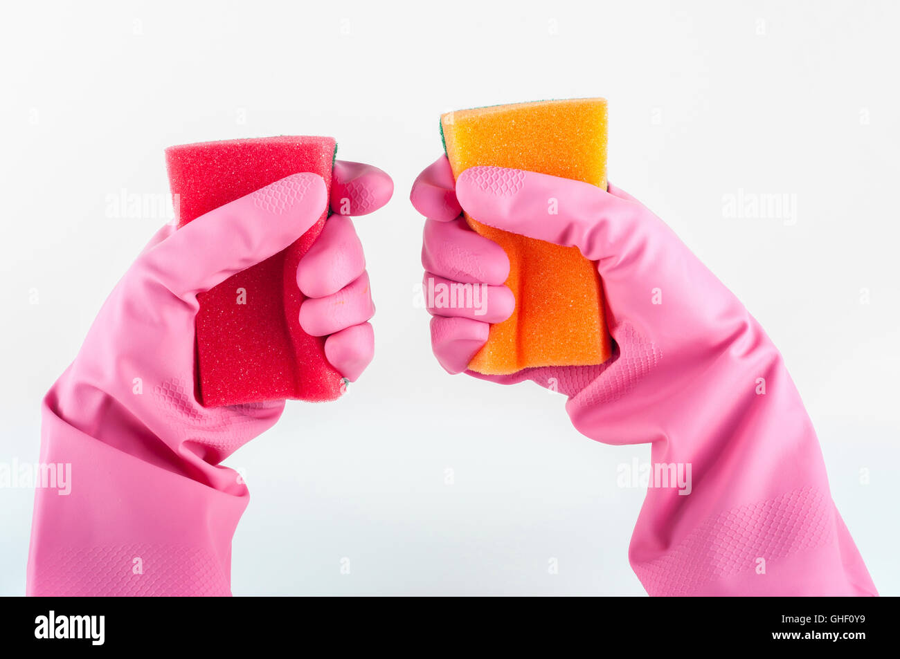 rubber gloves with sponge on a white background Stock Photo