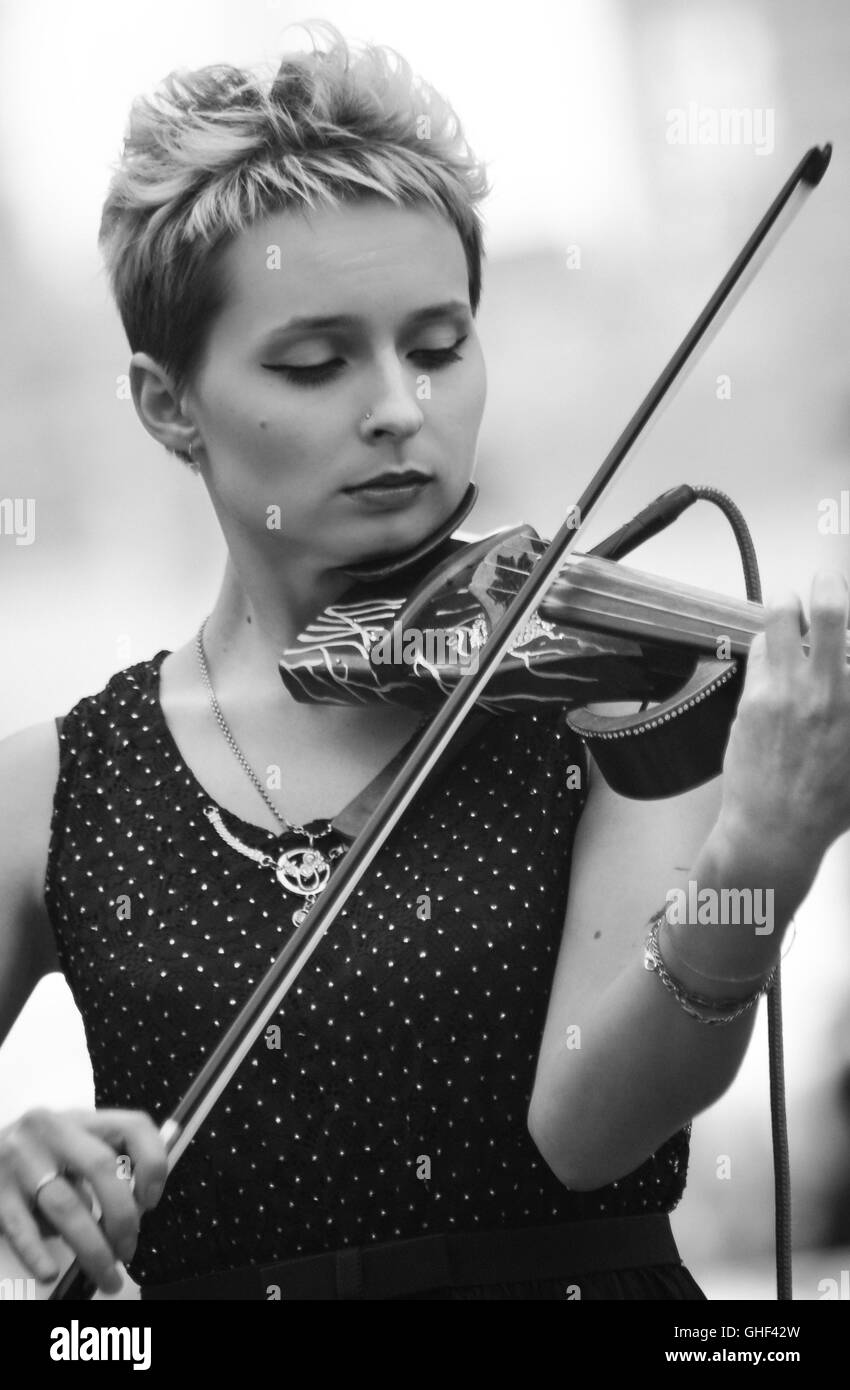 virtuoso violinist violin theater music blackandwhite pixie musician arts playing musical sounds lady artist Stock Photo