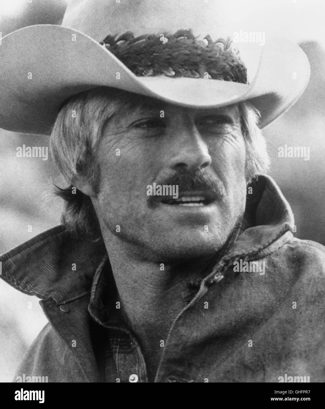 The five-time world champion cowboy Sonny Steele (ROBERT REDFORD) who disappears into the Nevada desert riding a stolen thoroughbred stallion. Regie: Sydney Pollack Stock Photo