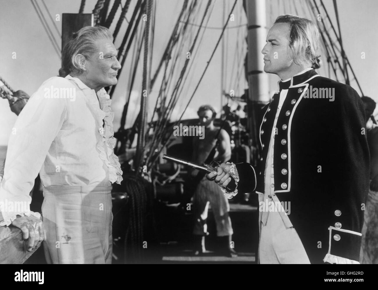 Mutiny on the Bounty TREVOR HOWARD (Captain Bligh), MARLON BRANDO (Lt. Fletcher Christian) Regie: Lewis Milestone aka. Mutiny on the Bounty Stock Photo