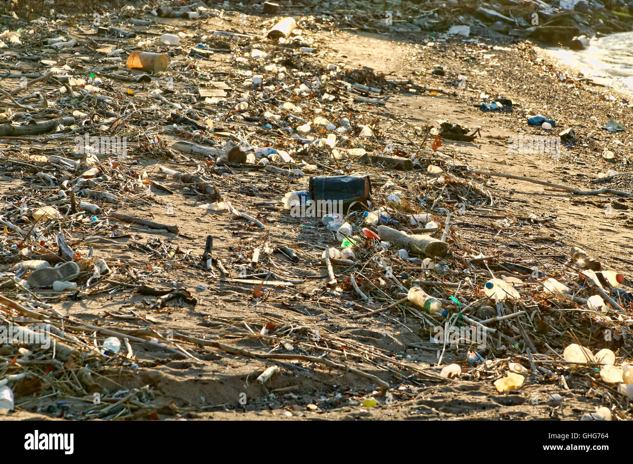 View of garbage mostly plastic bottles on a waterway in the industrial area of New Jersey Stock Photo
