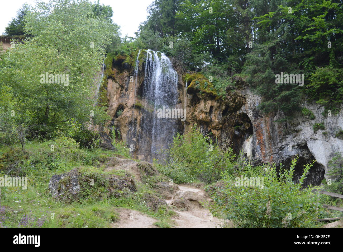 Waterfall on the edge of a cliff Stock Photo