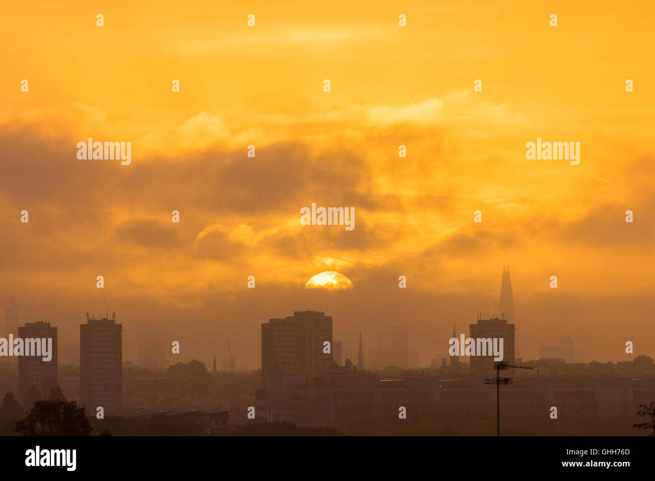 Acton, London, September 28th 2016. UK Weather: Distant skyscrapers in the city appear through the haze as a new day dawns in London, photographed from the A40 in Acton. Credit:  Paul Davey/Alamy Live News Stock Photo
