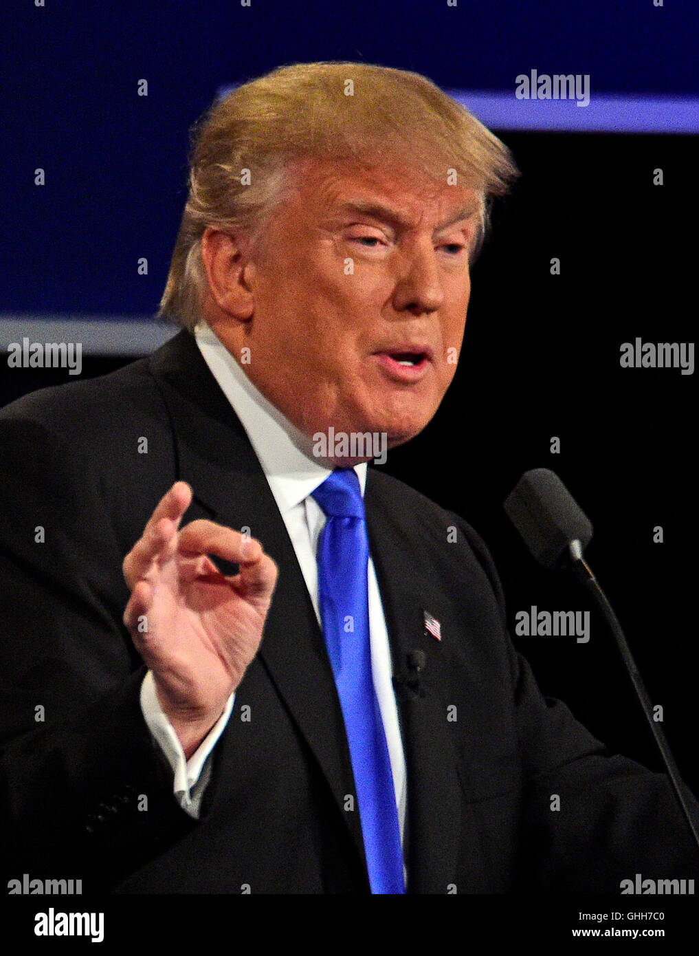 Hempstead, Us. 26th Sep, 2016. Businessman Donald J. Trump, the Republican Party nominee for President of the United States, makes a point as he appears with former US Secretary of State Hillary Clinton, the Democratic Party nominee for President of the US in the first of three presidential general election debates at Hofstra University in Hempstead, New York on Monday, September 26, 2016. Credit: Ron Sachs/CNP (RESTRICTION: NO New York or New Jersey Newspapers or newspapers within a 75 mile radius of New York City) - NO WIRE SERVICE - © dpa/Alamy Live News Stock Photo