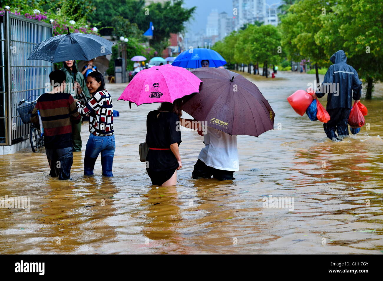 Ningde, China's Fujian Province. 28th Sep, 2016. People walk on a ...