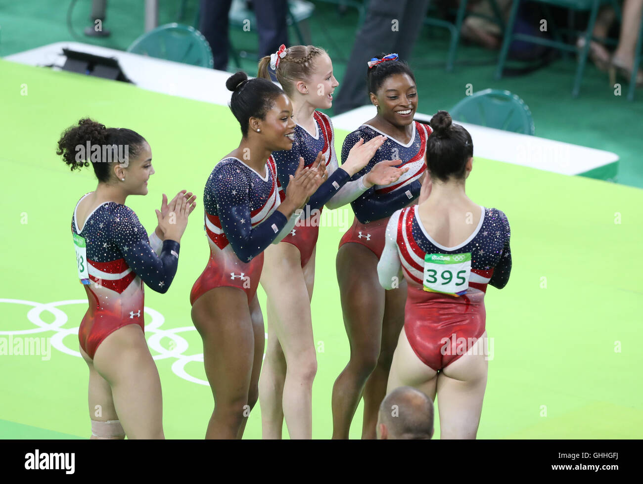 USA's Simone Biles (top right) and team-mates celebrate winning gold in the Women's Gymnastics Team Final at the Rio Olympic Arena on the fourth day of the Rio Olympic Games, Brazil. PRESS ASSOCIATION Photo. Picture date: Tuesday August 9, 2016. Photo credit should read: Martin Rickett/PA Wire. RESTRICTIONS - Editorial Use Only. Stock Photo