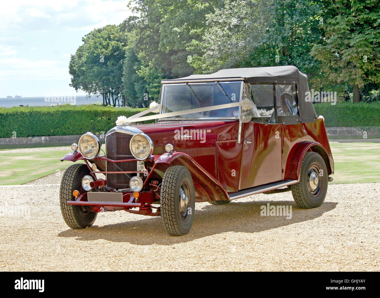 A Wedding Car pulling up to the ceremony Stock Photo Alamy