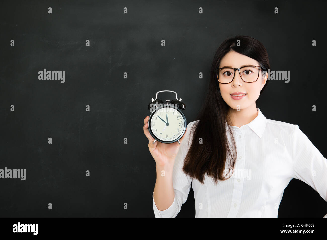 A good teacher must know to be on time is very important for school Stock Photo