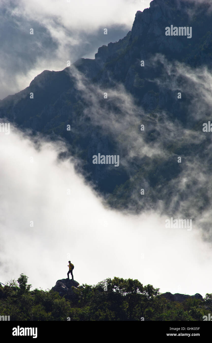 Mountain peaks of Suva Planina at morning covered with clouds Stock Photo