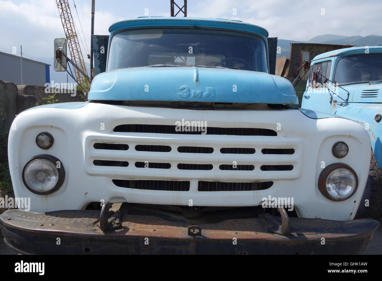 Handsome bull nosed Russian truck parked in Armenian petrol station, NB hooks on bumper bar Stock Photo