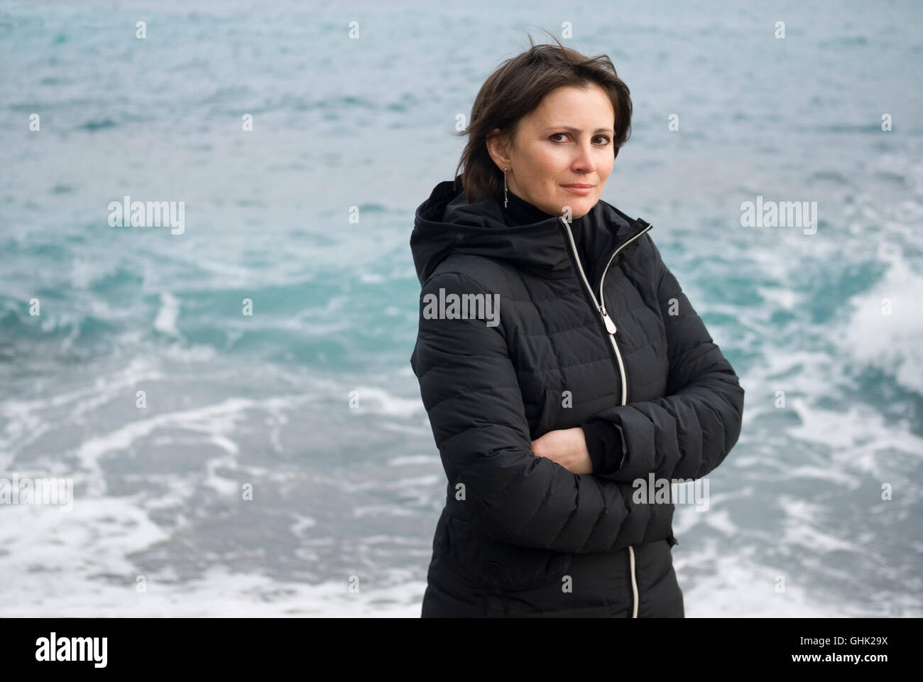 Woman standing front the sea Stock Photo - Alamy