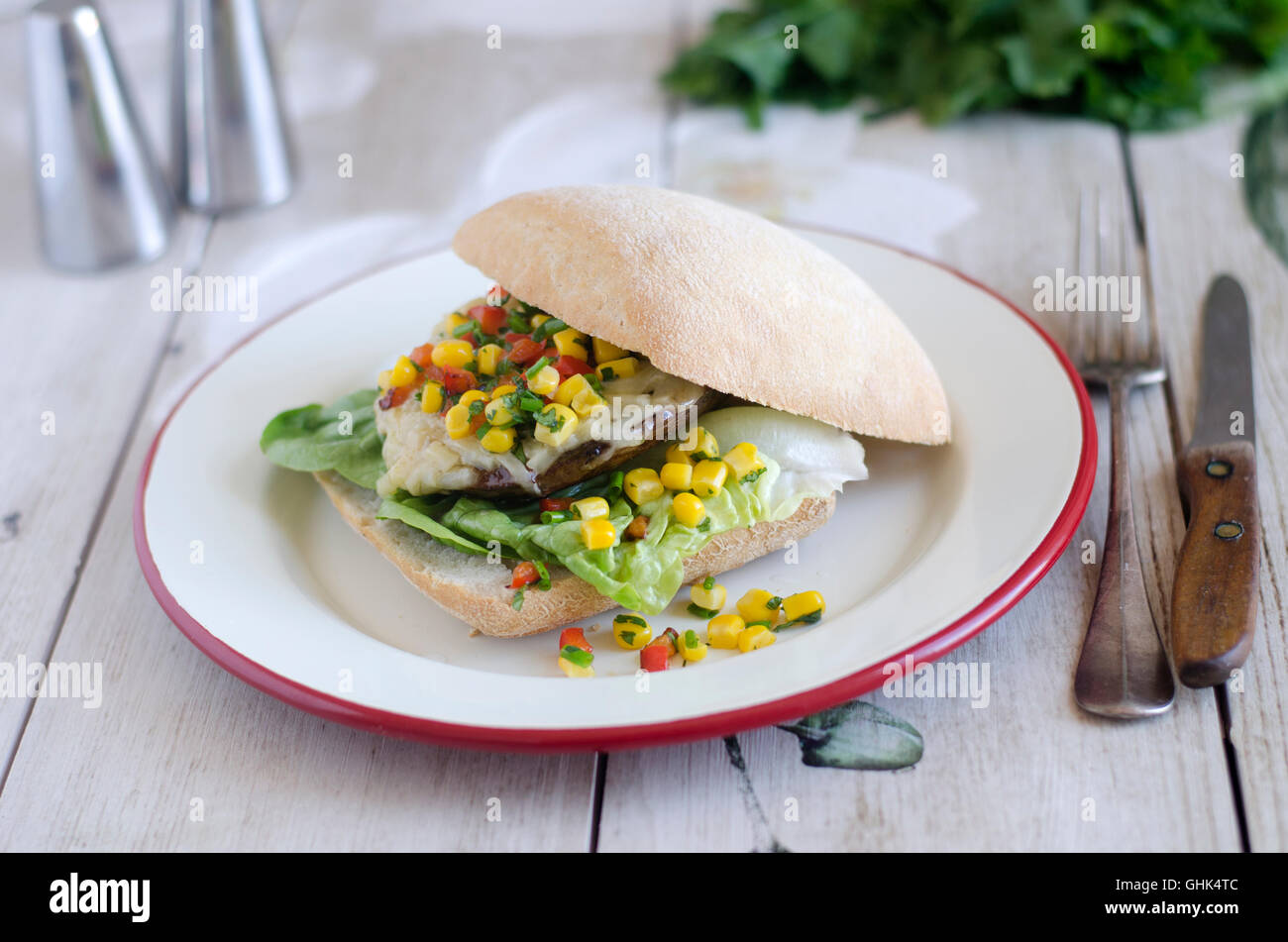 Mushroom and gruyere burger with sweetcorn salsa Stock Photo Alamy