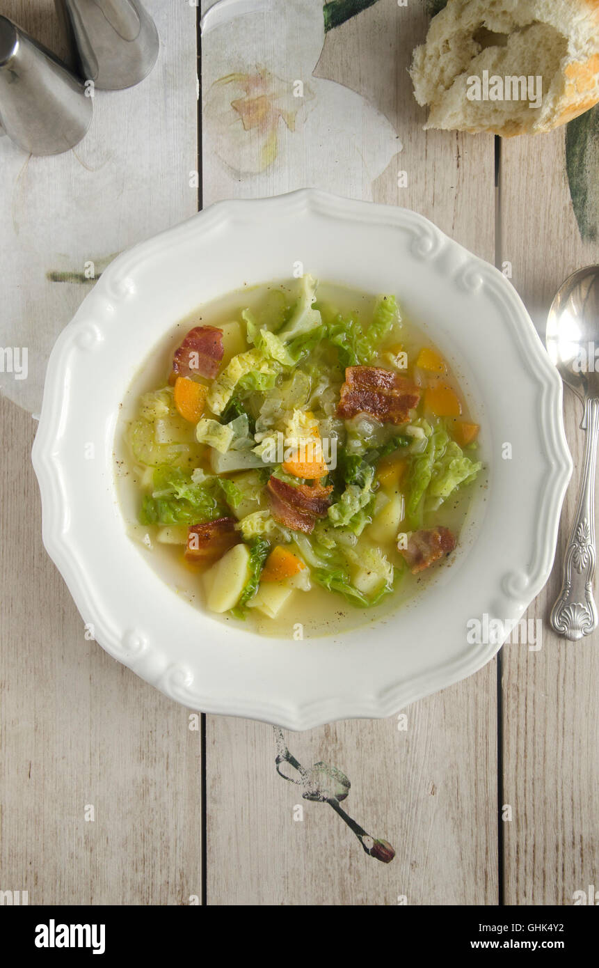 Potato and savoy cabbage soup with bacon Stock Photo Alamy