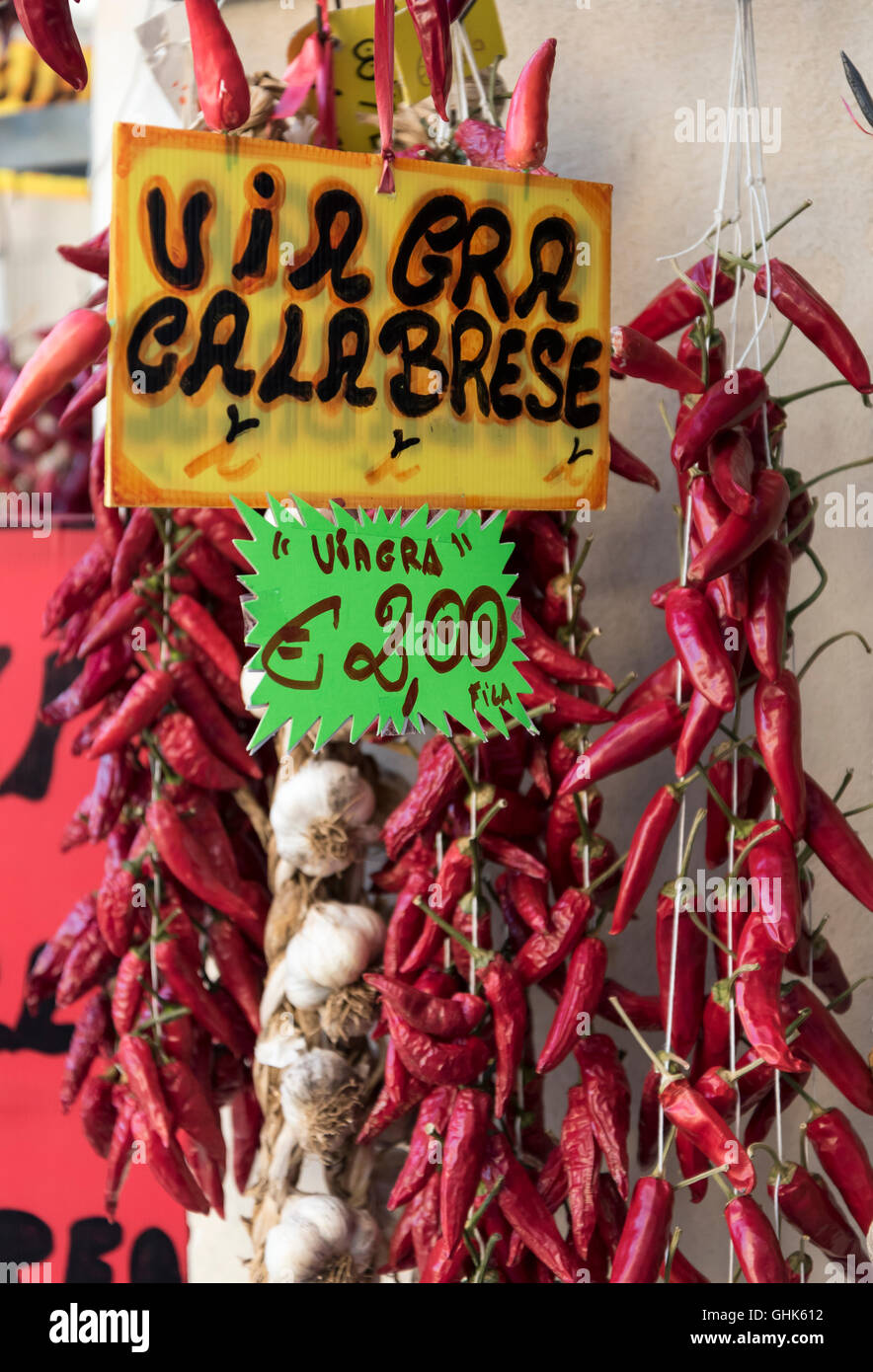 Red Chili Peppers advertised as natural viagra on sale in Tropea, Calabria, Italy Stock Photo