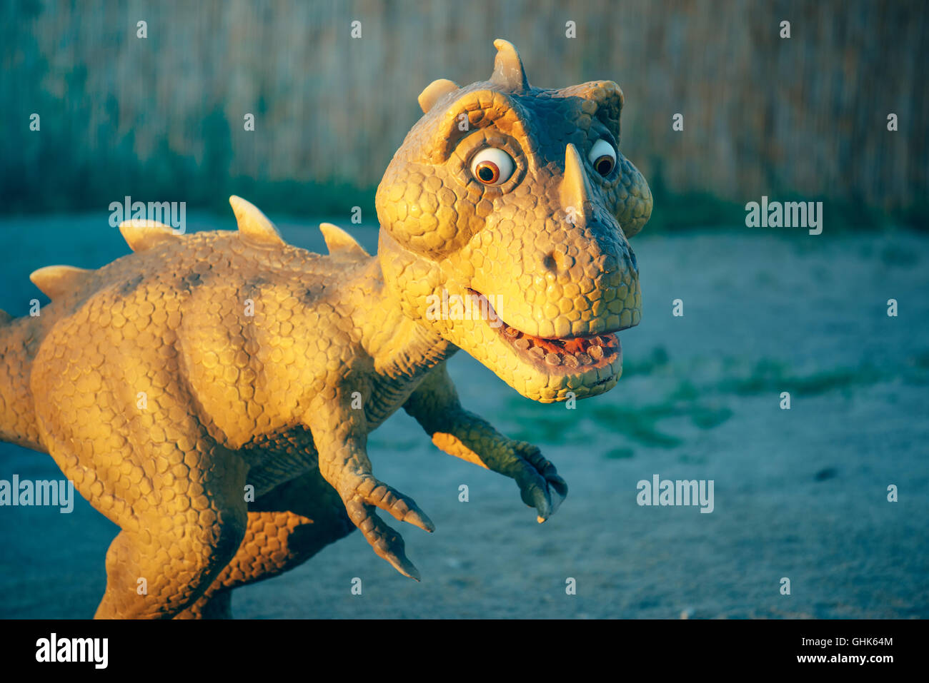NOVI SAD, SERBIA - AUGUST 7, 2016: Small dinosaur toy from themed entertainment Dino Park in Novi Sad. Stock Photo