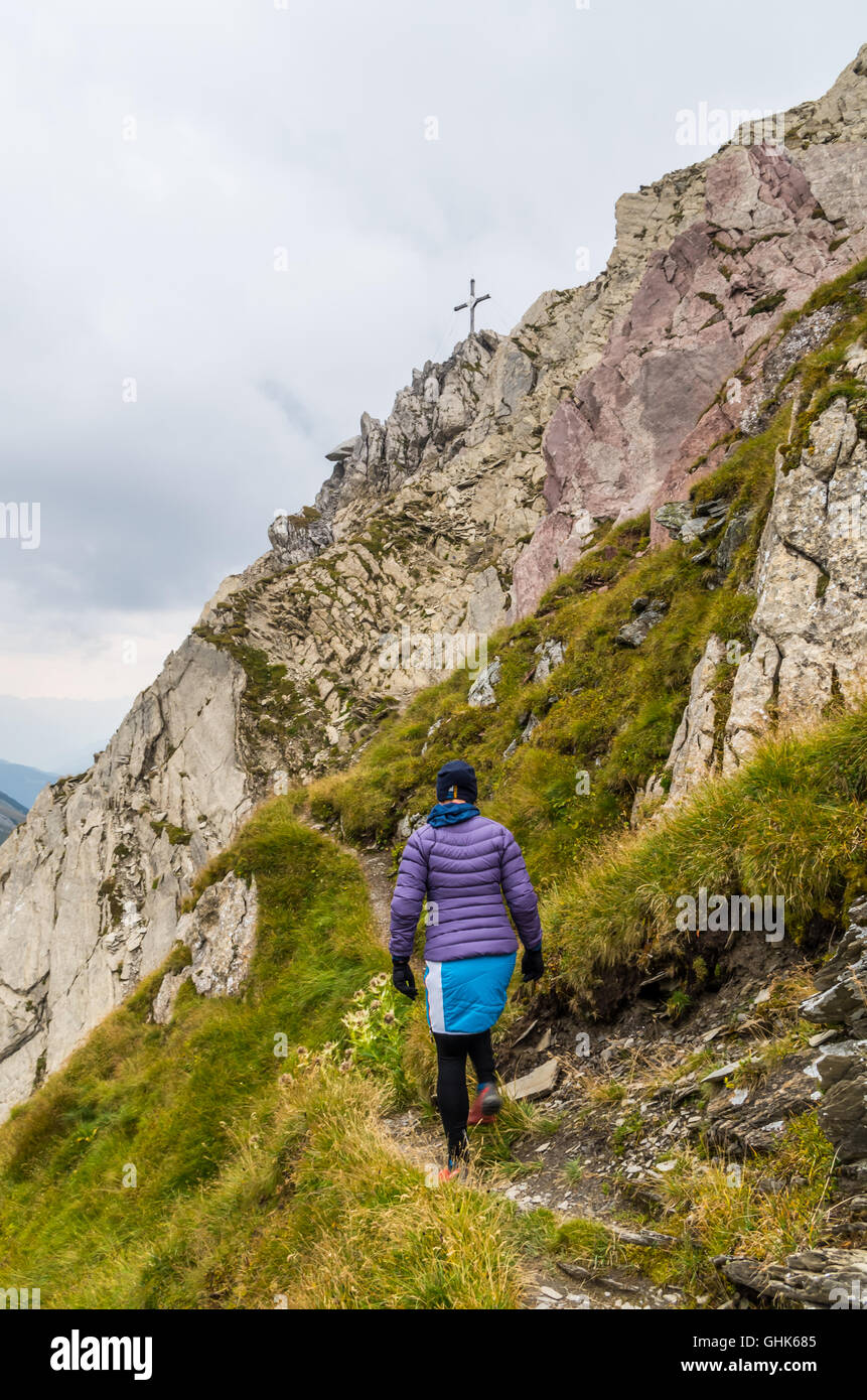 Female mountaineering in the Lechtal Alps near Kaiserjochhaus, North ...